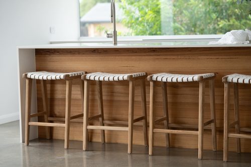 White woven saddle stool